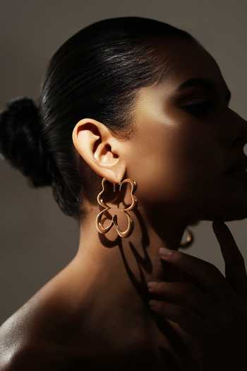 Varnika Arora_Gold Plated Gilded Flutter Hoop Earrings _at_Aza_Fashions