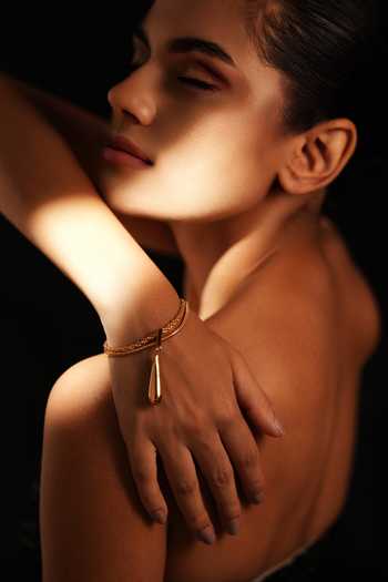 Shop_Varnika Arora_Gold Plated Pure Motion Bracelet _at_Aza_Fashions