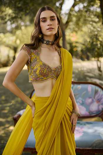 Ridhi Mehra_Yellow Organza, Chiffon, Net The Saga Pre-draped Saree With Embroidered Blouse _Online_at_Aza_Fashions