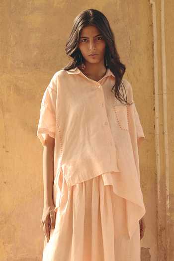Shop Nirvanaa_Peach Linen Button-down Neck Amara Asymmetric Shirt _Online_at_Aza_Fashions