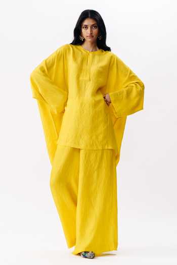 Buy_AK-OK_Mustard Silk Round Neck, Yes Boxy Kurta And Trouser Set _at_Aza_Fashions