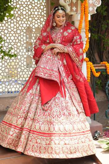Amaltas Couture_Red Silk, Organza, Net Raw Embroidered Bridal Lehenga Set _at_Aza_Fashions