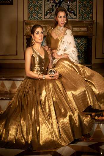ASHNA VASWANI_Gold Silk, Jacquard V-neck Crush Waistcoat And Lehenga Set _Online_at_Aza_Fashions