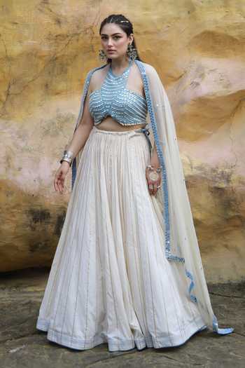 ASHNA VASWANI_Ivory Cotton, Denim Halter Neck Striped Lehenga Set _at_Aza_Fashions