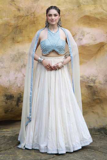 Buy_ASHNA VASWANI_Ivory Cotton, Denim Halter Neck Striped Lehenga Set _at_Aza_Fashions