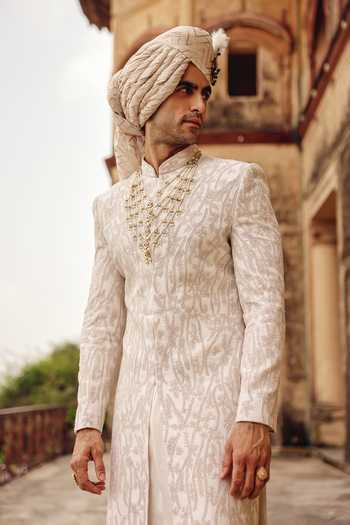 Shop_AMIT BEHKI_Ivory Silk Hand Embroidery Raw Achkan Set _Online_at_Aza_Fashions