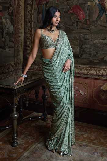 Seema Gujral_Green Georgette, Silk Sweetheart Neck Moss Sequin Saree With Blouse _Online_at_Aza_Fashions