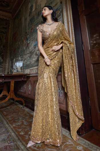 Buy_Seema Gujral_Gold Net Sweetheart Neck Antique Crystal Saree With Blouse _Online_at_Aza_Fashions