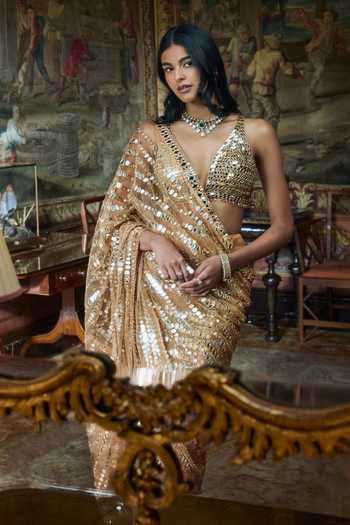Seema Gujral_Gold Net Halter Neck Mirror Work Saree With Blouse _Online_at_Aza_Fashions