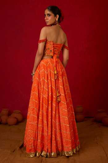 Shop_Nitara Dhanraj Label_Orange Crepe Embroidery, Sequins, Zari Bandeau Neck Corset And Skirt Set _at_Aza_Fashions