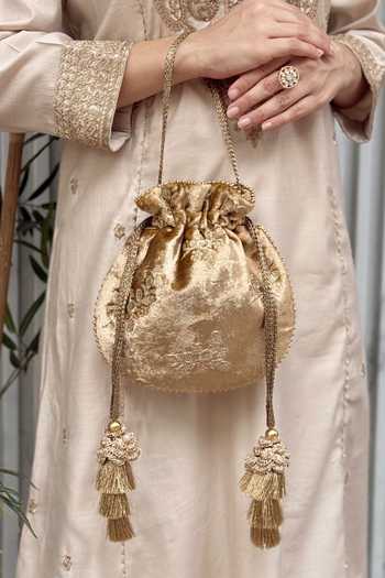 Buy_AMYRA_Gold Embroidery, Beads, Tassels, Metallic Thread Ras Velvet Potli _at_Aza_Fashions