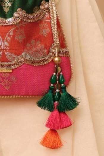 AMYRA_Multi Color Beads, Zari, Tassels, Bahaar Scallop Embellished Pure Silk Potli _at_Aza_Fashions