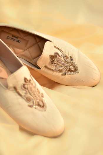Around Always_Ivory Tejas Embroidered Crest Juttis _Online_at_Aza_Fashions