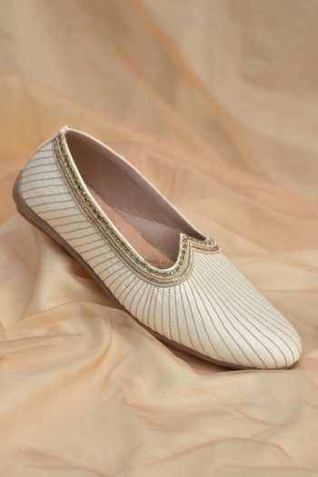 Buy_Around Always_Ivory Shaurya Stitched Juttis _Online_at_Aza_Fashions