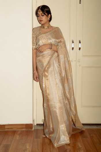 Buy_Priyanka Raajiv_Ivory Silk Ajita Banarasi Saree With Unstitched Blouse Piece _at_Aza_Fashions