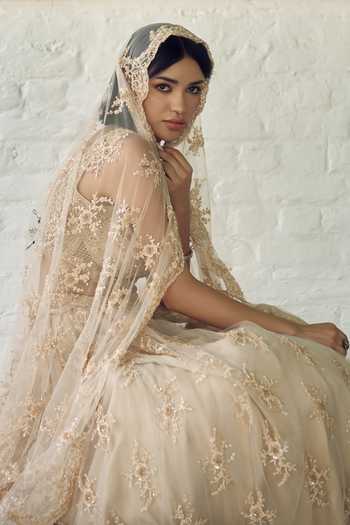 Meenagurnam_Ivory Net V-neck Embellished Lehenga Set _at_Aza_Fashions