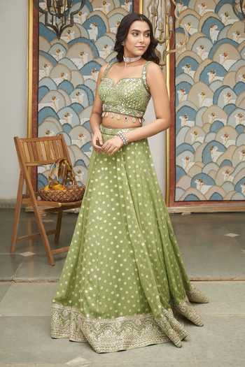 Meenagurnam_Green Net Sweetheart Neck Embellished And Woven Lehenga Set _at_Aza_Fashions