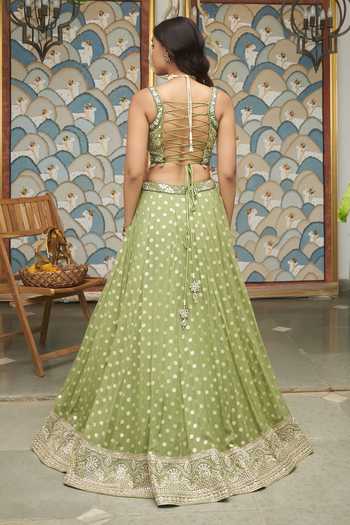 Shop_Meenagurnam_Green Net Sweetheart Neck Embellished And Woven Lehenga Set _at_Aza_Fashions