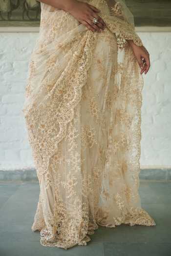 Meenagurnam_Ivory Net Sweetheart Neck Embellished Saree With Choli _at_Aza_Fashions