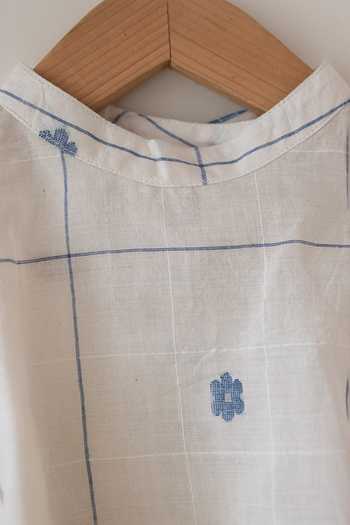 Buy_Love The World Today_Off White Cotton Lullaby Skies Woven Top _Online_at_Aza_Fashions
