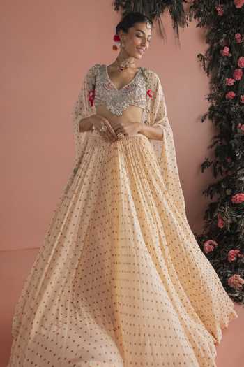Shop_Bhumika Sharma_Beige Georgette V-neck Rimza Printed Cape Skirt Set _at_Aza_Fashions