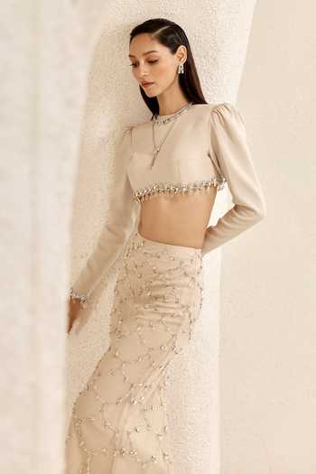 Nirmooha_Ivory Satin, Net, Bemberg, Microfiber Crescent Embellished Crop Top Skirt Set _at_Aza_Fashions
