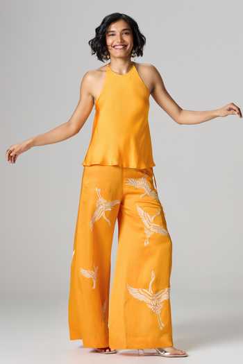 Shop_Dilnaz_Yellow Satin, Linen Halter Neck Windswept Embroidered Trouser Set _Online_at_Aza_Fashions