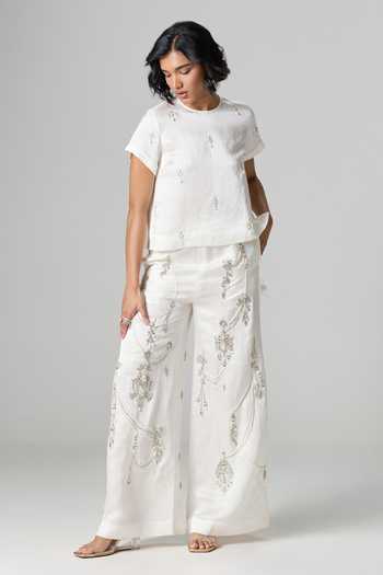 Buy_Dilnaz_Ivory Linen Round Neck Milky Way Embellished Trouser Set _at_Aza_Fashions