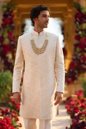 Shop_Seema Gujral_Cream Silk Pearl Embroidered Sherwani Set _at_Aza_Fashions
