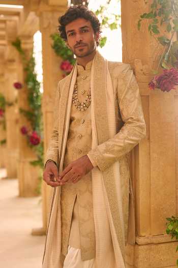 Seema Gujral_Gold Silk, Cotton Embroidered Sherwani Set _at_Aza_Fashions