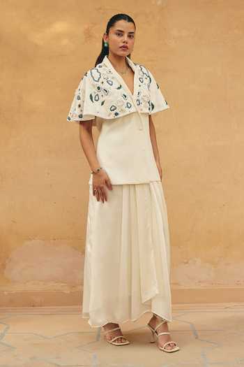 Shop_Maenaam_Ivory Satin V-neck Sena Layered Top And Draped Skirt Set _Online_at_Aza_Fashions
