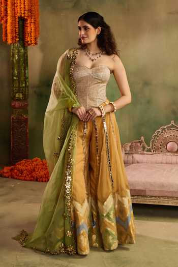 Buy_Reeti Arneja_Yellow Chanderi Sweetheart Neck Chamkeeli Haldi Sharara Set _at_Aza_Fashions