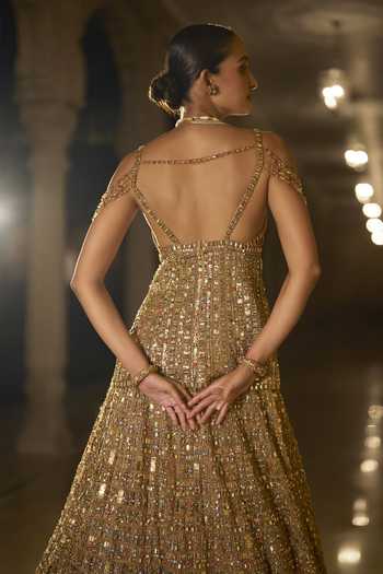 Shop_Seema Gujral_Gold Net Sweetheart Neck Stone Embellished Lehenga Set _at_Aza_Fashions