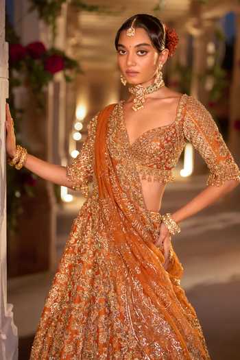 Buy_Seema Gujral_Orange Silk, Net Sweetheart Neck Zardozi Cutwork Embroidered Bridal Lehenga Set _Online_at_Aza_Fashions