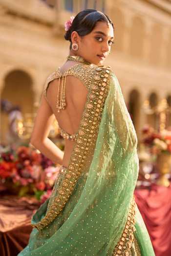 Shop_Seema Gujral_Green Silk, Organza Sweetheart Neck Gold Zardozi Bridal Lehenga Set _at_Aza_Fashions
