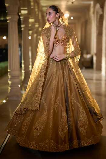 Buy_Seema Gujral_Gold Velvet, Silk, Net Sweetheart Neck Paisley Embroidered Lehenga Set _at_Aza_Fashions