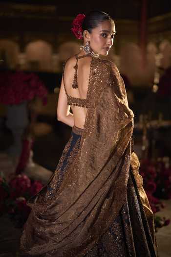 Shop_Seema Gujral_Gold Silk, Tissue Sweetheart Neck Paisley Embroidered Lehenga Set _at_Aza_Fashions