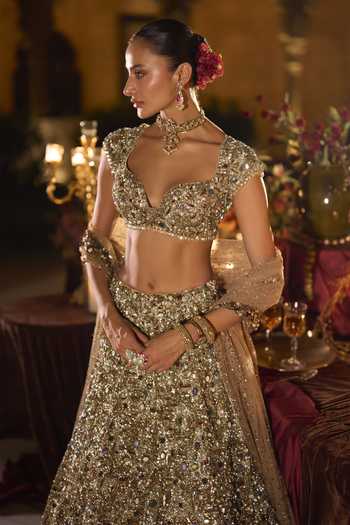 Shop_Seema Gujral_Gold Net Sweetheart Neck Jeweled Embroidered Lehenga Set _Online_at_Aza_Fashions