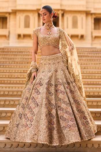Buy_Seema Gujral_Gold Net, Tissue Round Neck Zardozi Embroidered Bridal Lehenga Set _at_Aza_Fashions