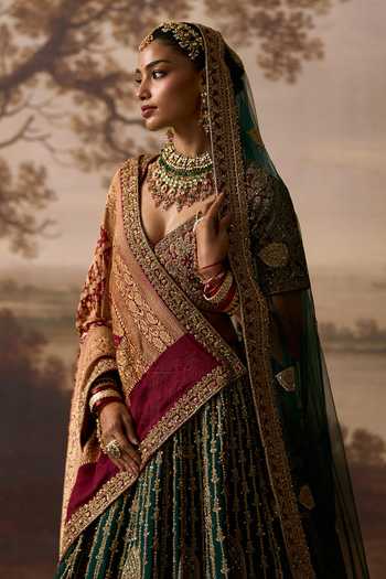 ANGAD SINGH_Emerald Green Silk V-neck Raavi Raw Bridal Lehenga Set _Online_at_Aza_Fashions