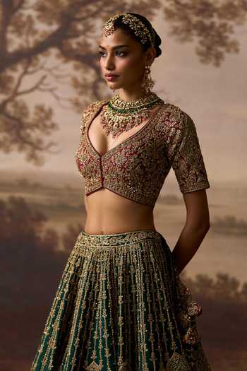 Shop_ANGAD SINGH_Emerald Green Silk V-neck Raavi Raw Bridal Lehenga Set _Online_at_Aza_Fashions
