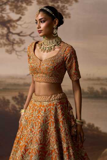 ANGAD SINGH_Orange Silk Sweetheart Neck Kesar Raw Bridal Lehenga Set _Online_at_Aza_Fashions
