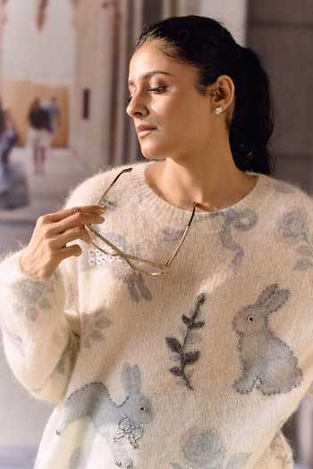 Maison Aguise_Ivory Knit Round Neck Rabbit Motif Embellished Cardigan _at_Aza_Fashions