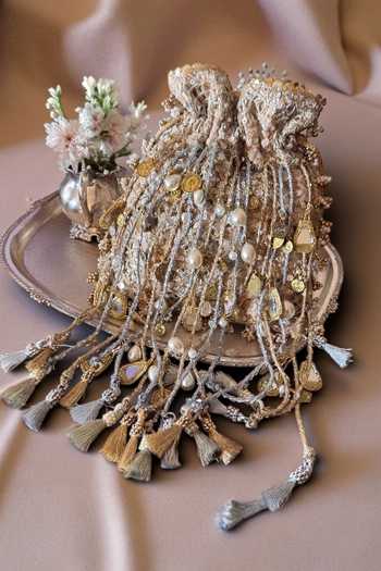 Shop_Bhavna Kumar_Gold Sequins, Beads, Pearls, Mirrors, Tassels Rope Embellished Potli _at_Aza_Fashions