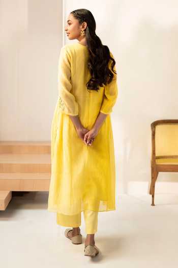 Shop_AM By Anita Mittal_Yellow Chanderi Round Neck, Yes Zavi Mul Tunic And Pant Set _at_Aza_Fashions