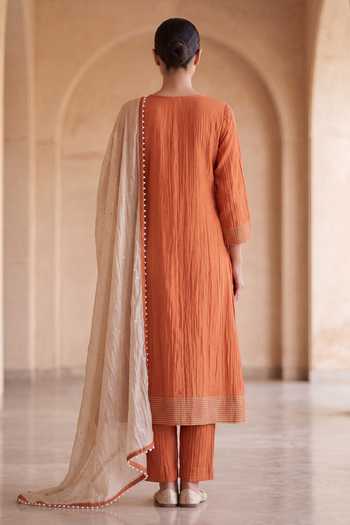 Shop_Two Sisters By Gyans_Orange Chanderi Round Neck Hand Floral Embroidered Kurta Set _at_Aza_Fashions