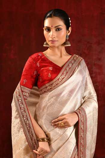 singhanias_Gold Tissue V-neck Saree With Running Blouse Fabric _at_Aza_Fashions