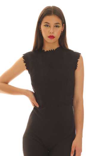 Parneet Gujral_Black Crepe Round Neck Cutwork Embroidered Jumpsuit _at_Aza_Fashions