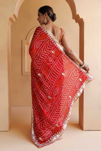 Shop_Geroo Jaipur_Red Georgette One Shoulder Bandhani Gota Patti Saree Set With Blouse And Petticoat _at_Aza_Fashions