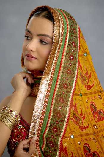 Torani_Yellow Silk, Organza Sequins Sweetheart Neck Kanak Meher Corset Lehenga Set _Online_at_Aza_Fashions